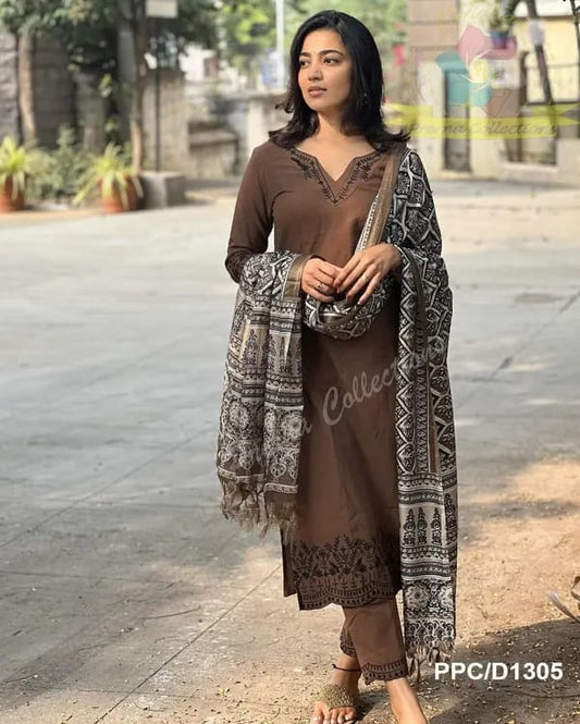 Khadi cotton kurti with intricate embroidery work on neck ,sleeves and hem paired with Khadi pants with embroidery work